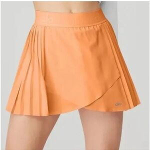ALO Yoga Orange Pleated Athletic Skirt